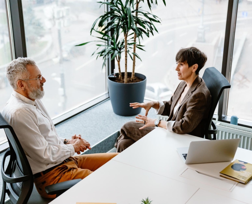 man and woman business meeting